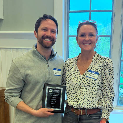 2026 community partner award winner, Grayson Barbot, pictured with exercise science internship coordinator Heather Peddie